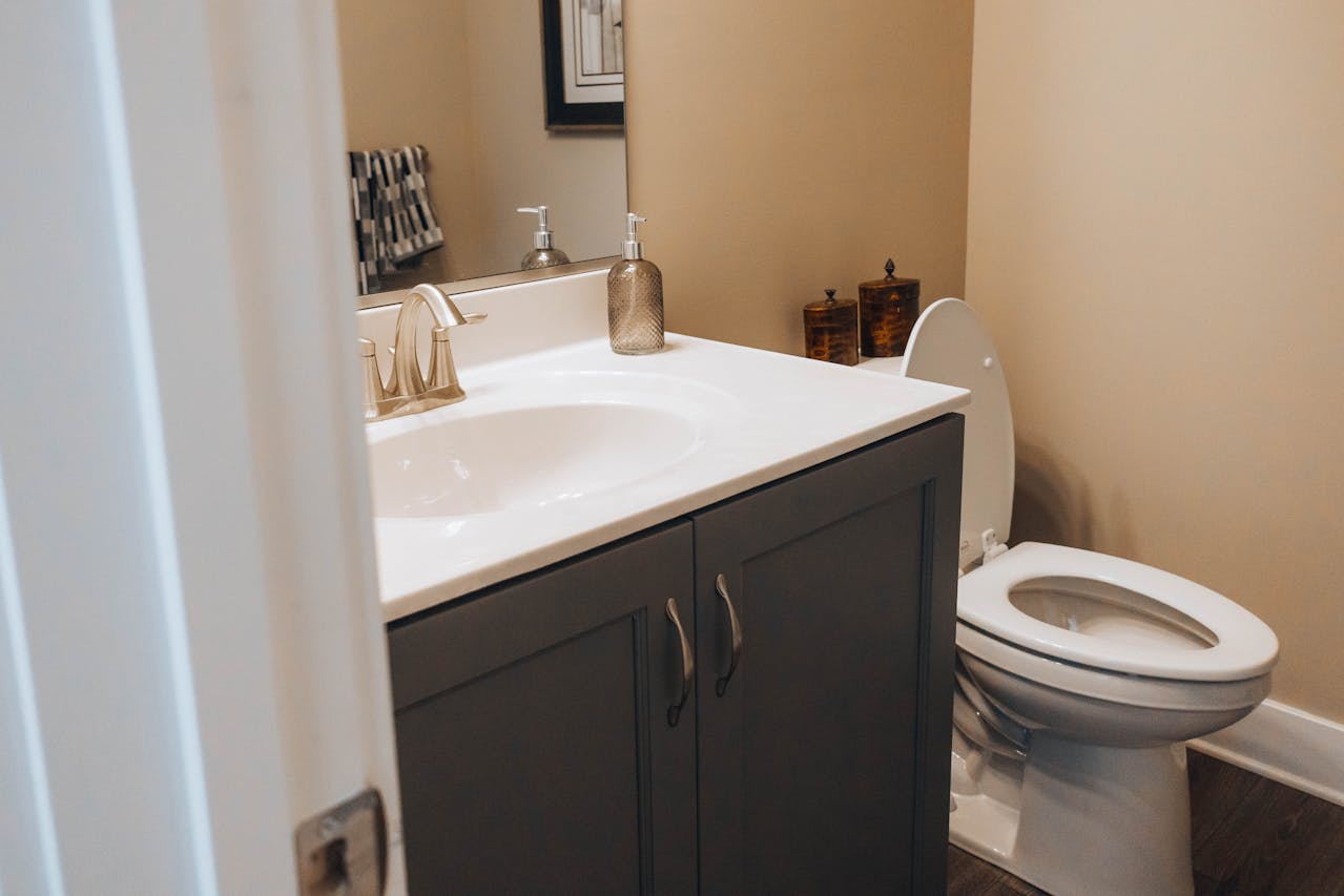 Ferndale plumbing specialist reviewing bathroom pipe materials