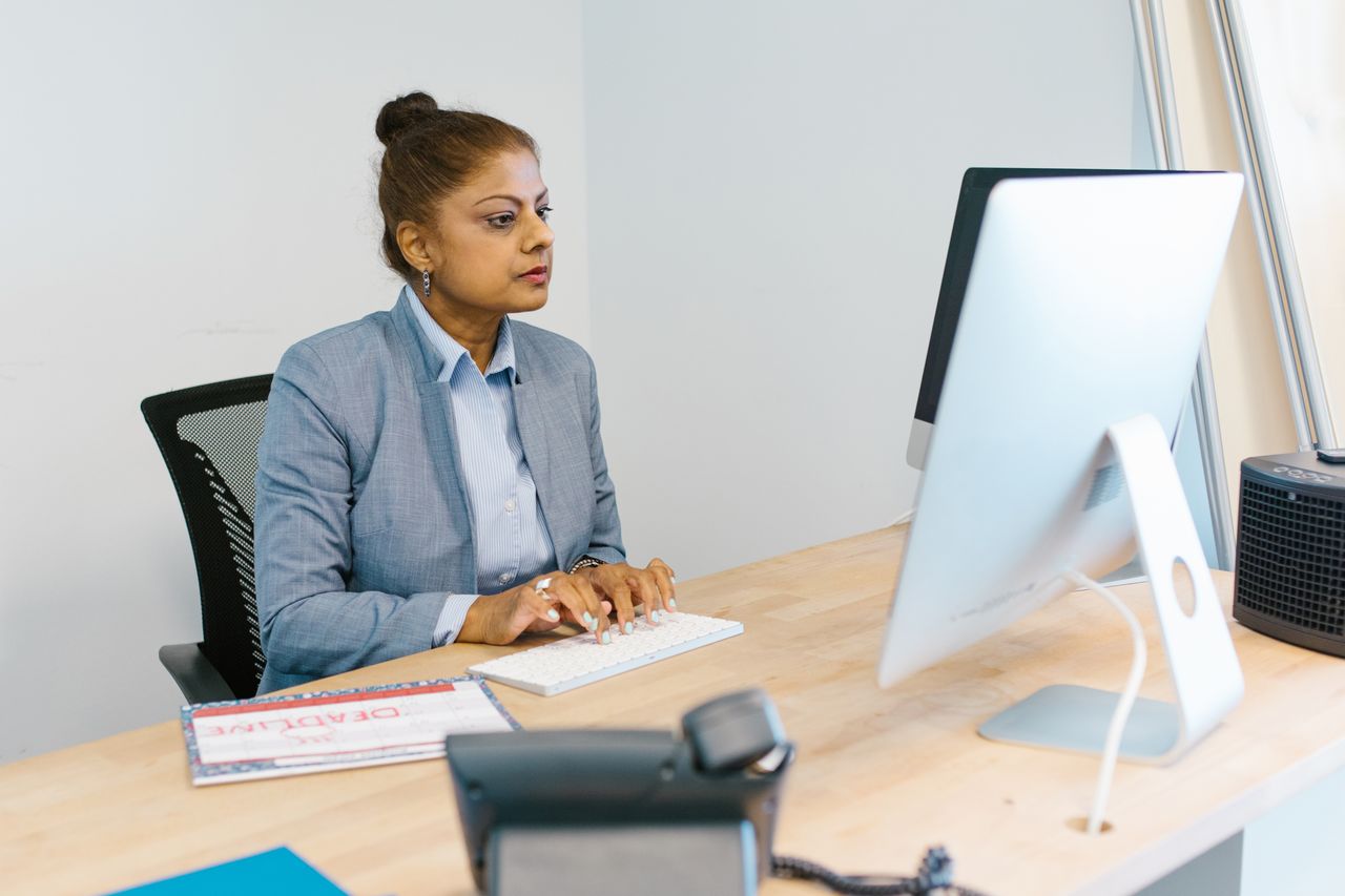Business employee managing digital documents on a computer